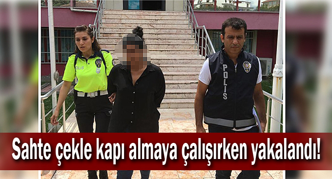 Sahte çekle kapı almaya çalışırken yakalandı!